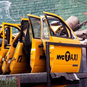 Former Mechanic Claims Taxi Repair Shops’ Pay Practices Unfair