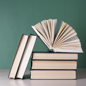 Employee Looks to Recover Allegedly Unpaid OT from Ambassador College Bookstores