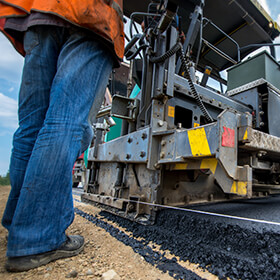 Lawsuit Alleges Blacktop Companies Underreported Laborers’ Overtime Hours