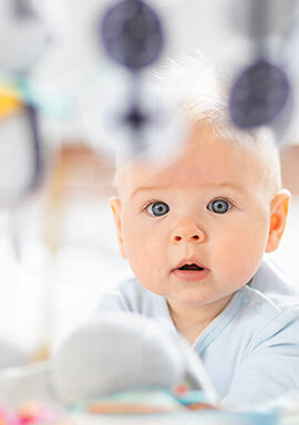 Fisher-Price Recall: Choking Hazard Sparks Class Action Lawsuit Over SnugaPuppy Activity Center